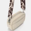 Bolso bandolera con estampado de vaca Bolso bandolera con estampado de vaca