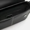 Bolso bandolera con pespuntes Bolso bandolera con pespuntes