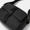 Bolso bandolera de tela recubierta de goma