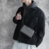 Bolso bandolera de tela recubierta de goma