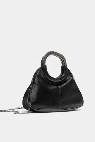 Bolso con asa metálica