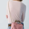 Bolso con asa metálica