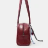 Bolso de hombro con adornos