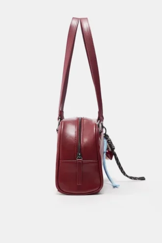 Bolso de hombro con adornos