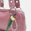 Bolso de hombro con adornos