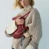 Bolso de hombro con adornos