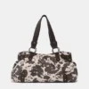 Bolso de hombro con estampado de vaca