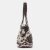 Bolso de hombro con estampado de vaca