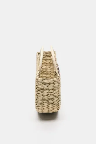 Bolso de mimbre con adornos