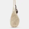 Bolso shopper con adornos de macramé Bolso shopper con adornos de macramé