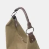 Bolso shopper con anillas y tachuelas