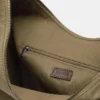 Bolso shopper con anillas y tachuelas