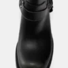 Botas altas de motero desgastadas Botas altas de motero desgastadas