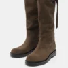 Botas altas de piel con hebilla Botas altas de piel con hebilla