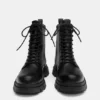 Botas con cordones y forro
