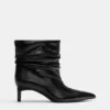 Botas de tacón alto con fruncidos