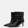 Botas de tacón alto con fruncidos