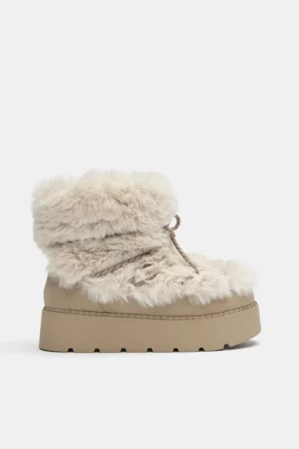 Botas planas de pelo sintético
