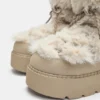 Botas planas de pelo sintético Botas planas de pelo sintético