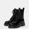 Botas planos con cordones Botas planos con cordones