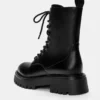 Botas planos con cordones Botas planos con cordones