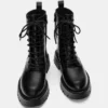 Botas planos con cordones Botas planos con cordones
