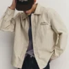 Camisas a rayas bordadas