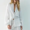 Camisas con cuello alto y efecto gasa Camisas con cuello alto y efecto gasa