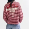 Camiseta a rayas con estrellas y eslogan Camiseta a rayas con estrellas y eslogan