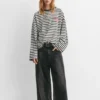 Camiseta a rayas con texto Camiseta a rayas con texto