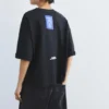 Camiseta con eslogan bordado en la etiqueta