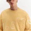 Camiseta de manga larga con bolsillo