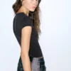 Camiseta negra con pedrería Camiseta negra con pedrería