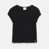 Camiseta negra con pedrería Camiseta negra con pedrería