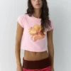 Camiseta rosa con estampado floral Camiseta rosa con estampado floral