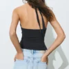 Camiseta sin mangas con cuello halter y detalles metalizados Camiseta sin mangas con cuello halter y detalles metalizados