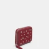 Cartera con tachuelas Cartera con tachuelas