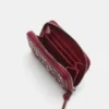 Cartera con tachuelas Cartera con tachuelas