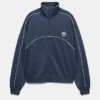 Chaqueta con cremallera bordada