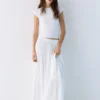 Falda midi fluida con paneles Falda midi fluida con paneles