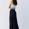 Falda midi fluida con paneles Falda midi fluida con paneles