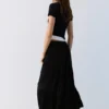 Falda midi fluida con paneles Falda midi fluida con paneles