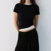 Falda midi fluida con paneles Falda midi fluida con paneles