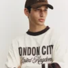 Gorra de pana marrón