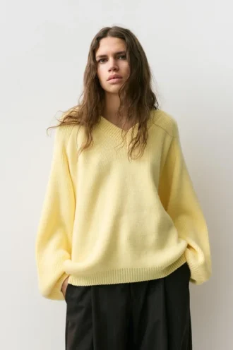 Jersey oversize con bajo asimétrico