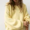 Jersey oversize con bajo asimétrico Jersey oversize con bajo asimétrico
