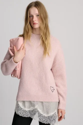 Jerséu rosa con corazón bordado