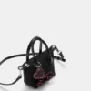 Mini bolso bandolera con adornos Mini bolso bandolera con adornos