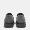 Mocasines gruesos de piel