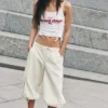 Pantalones capri técnicos de entrepierna baja